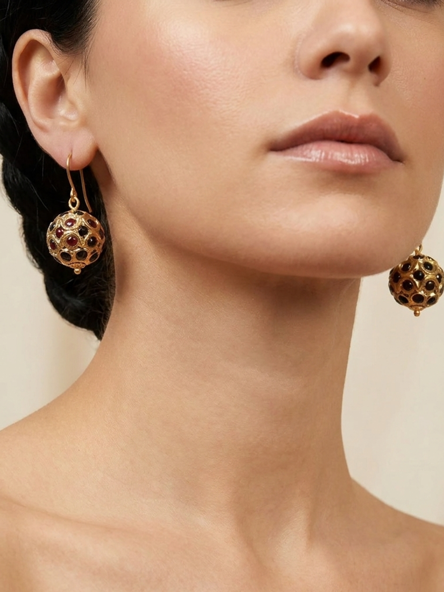 Gilded Bazaar Drops — handmade gold-tone beads jewelry by Sima & Sid, shown on a model