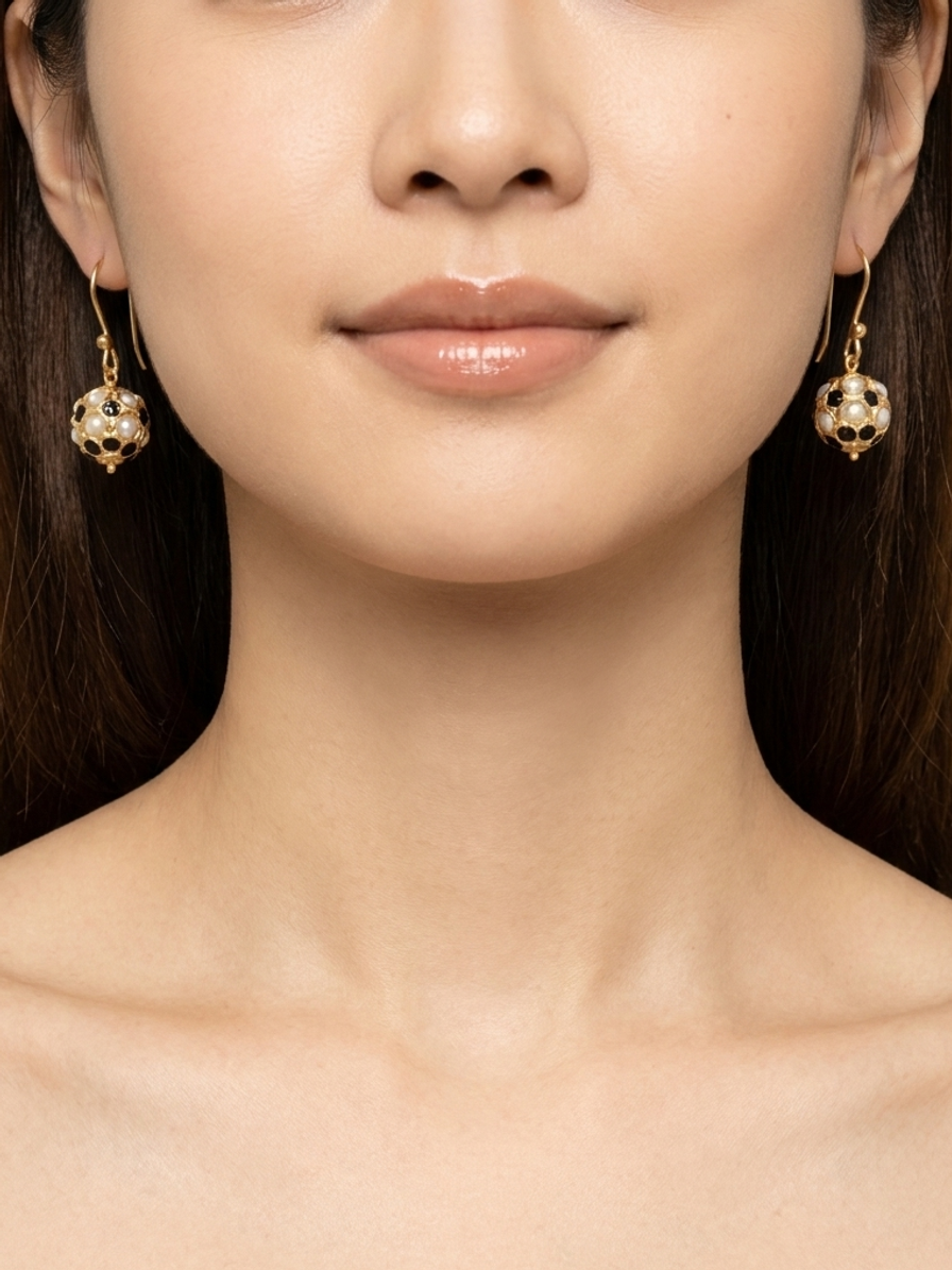 Gilded Lattice Drops — handmade gold-tone openwork beads jewelry by Sima & Sid, shown on a model