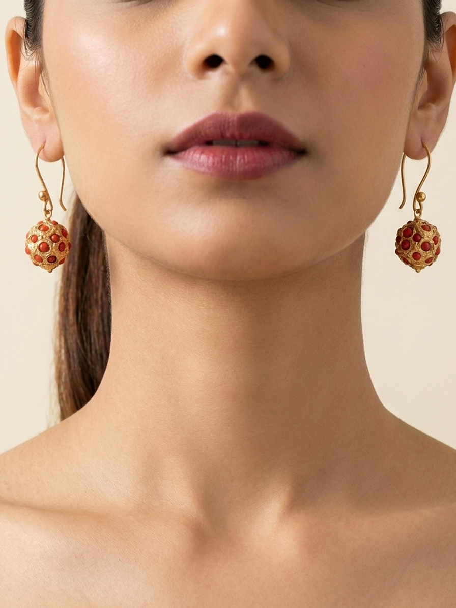 Coral Majlis Drops — handmade gold-tone filigree jewelry by Sima & Sid, shown on a model