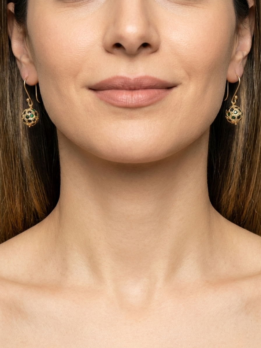 Emerald Majlis Drops — handmade gold-tone metal beads jewelry by Sima & Sid, shown on a model