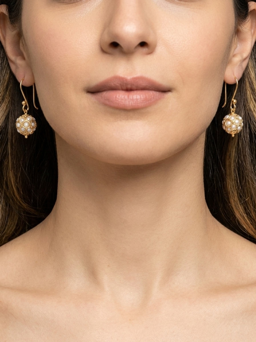 Pearl Honeycomb Drops — handmade white pearls jewelry by Sima & Sid, shown on a model