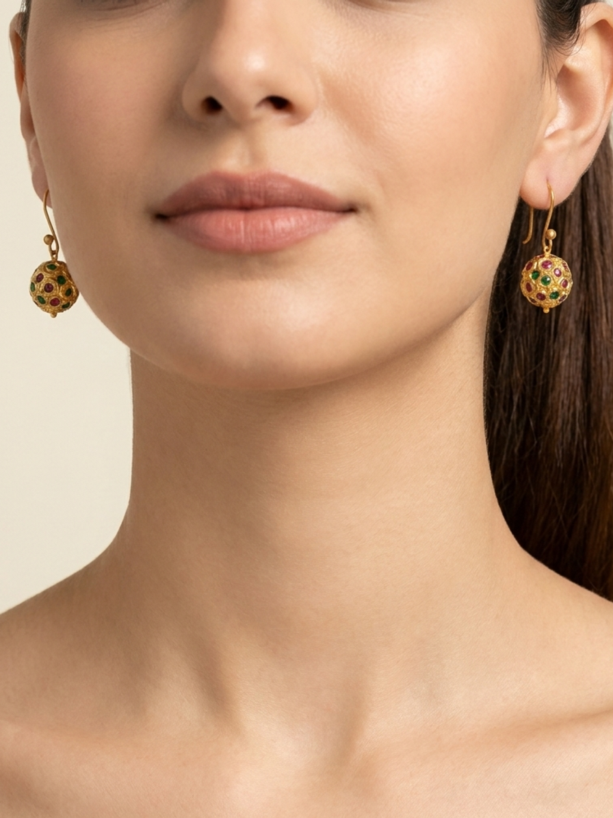 Gilded Pavilion Drops — handmade gold-tone beads jewelry by Sima & Sid, shown on a model