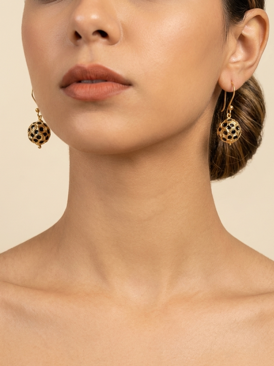 Midnight Lattice Drops — handmade gold-tone filigree jewelry by Sima & Sid, shown on a model