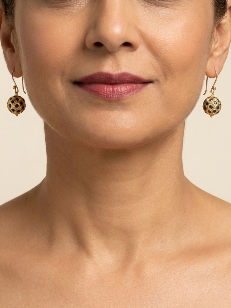 Gilded Scroll Drops — handmade gold-tone filigree beads jewelry by Sima & Sid, shown on a model
