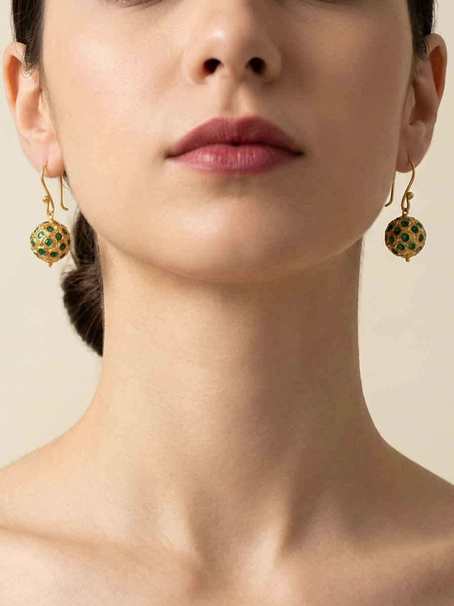 Emerald Filigree Drops — handmade gold-tone filigree jewelry by Sima & Sid, shown on a model