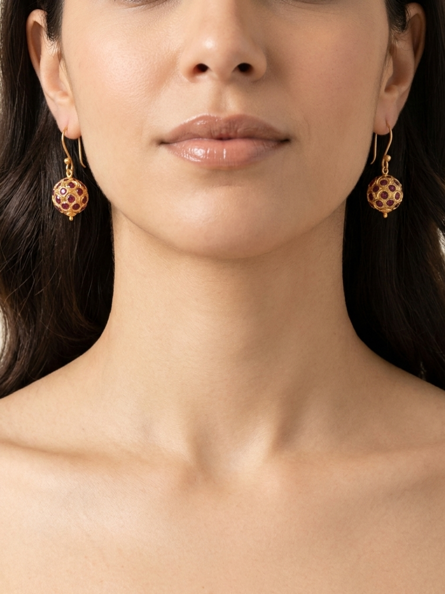 Crimson Honeycomb Drops — handmade gold-tone metal beads jewelry by Sima & Sid, shown on a model