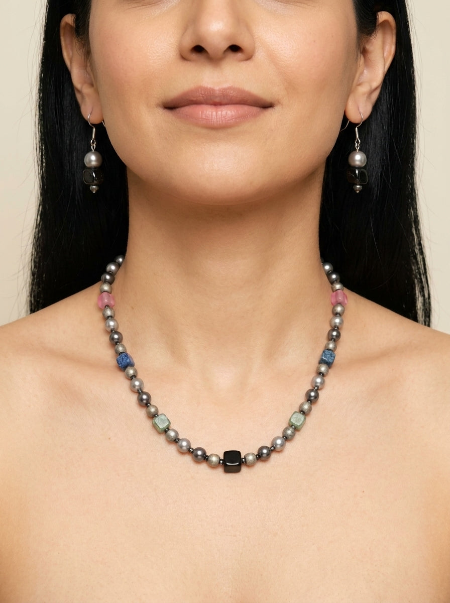 Gunmetal Kaleidoscope Set — handmade silver-grey faux pearls jewelry by Sima & Sid, shown on a model