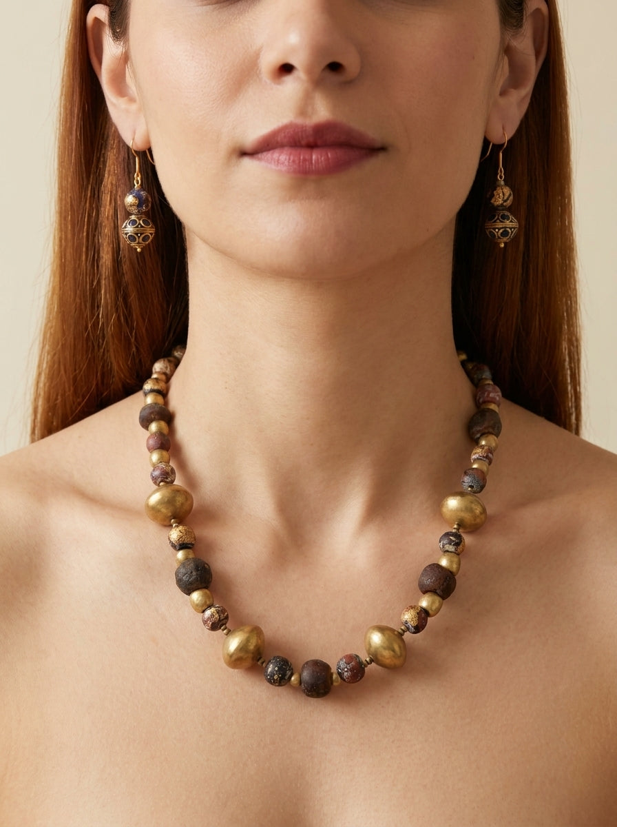 Espresso Pavilion Set — handmade gold-foiled glass beads jewelry by Sima & Sid, shown on a model