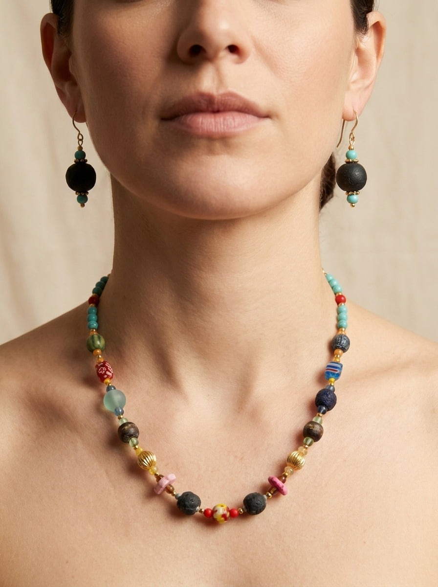 Magma Mosaic Set — handmade millefiori glass jewelry by Sima & Sid, shown on a model