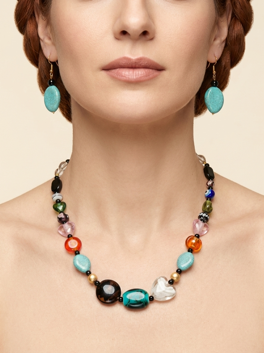 Noir Kaleidoscope Set — handmade lampwork glass jewelry by Sima & Sid, shown on a model