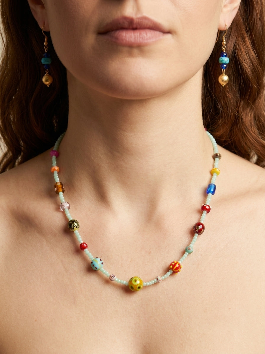 Mint Kaleidoscope Set — handmade lampwork glass beads jewelry by Sima & Sid, shown on a model