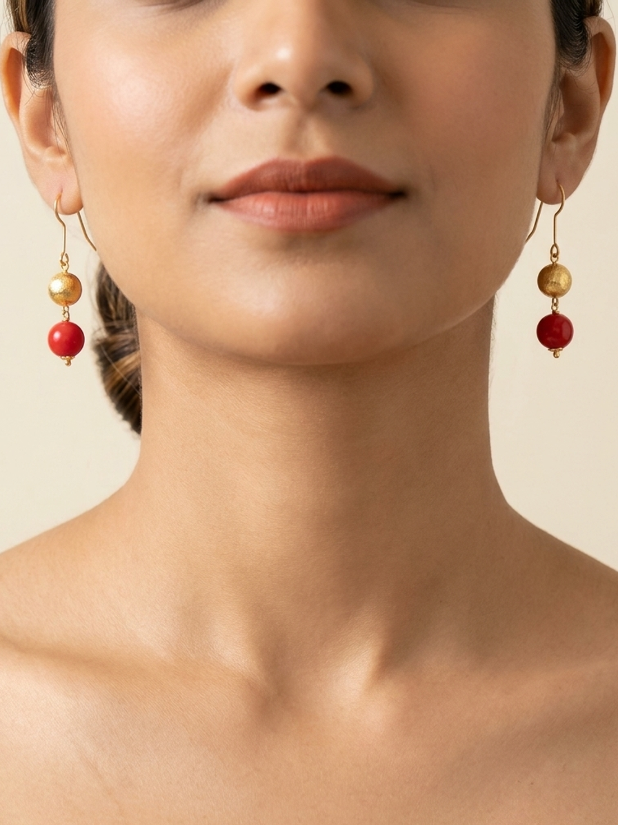Crimson Reverie Drops — handmade cherry red stone beads jewelry by Sima & Sid, shown on a model