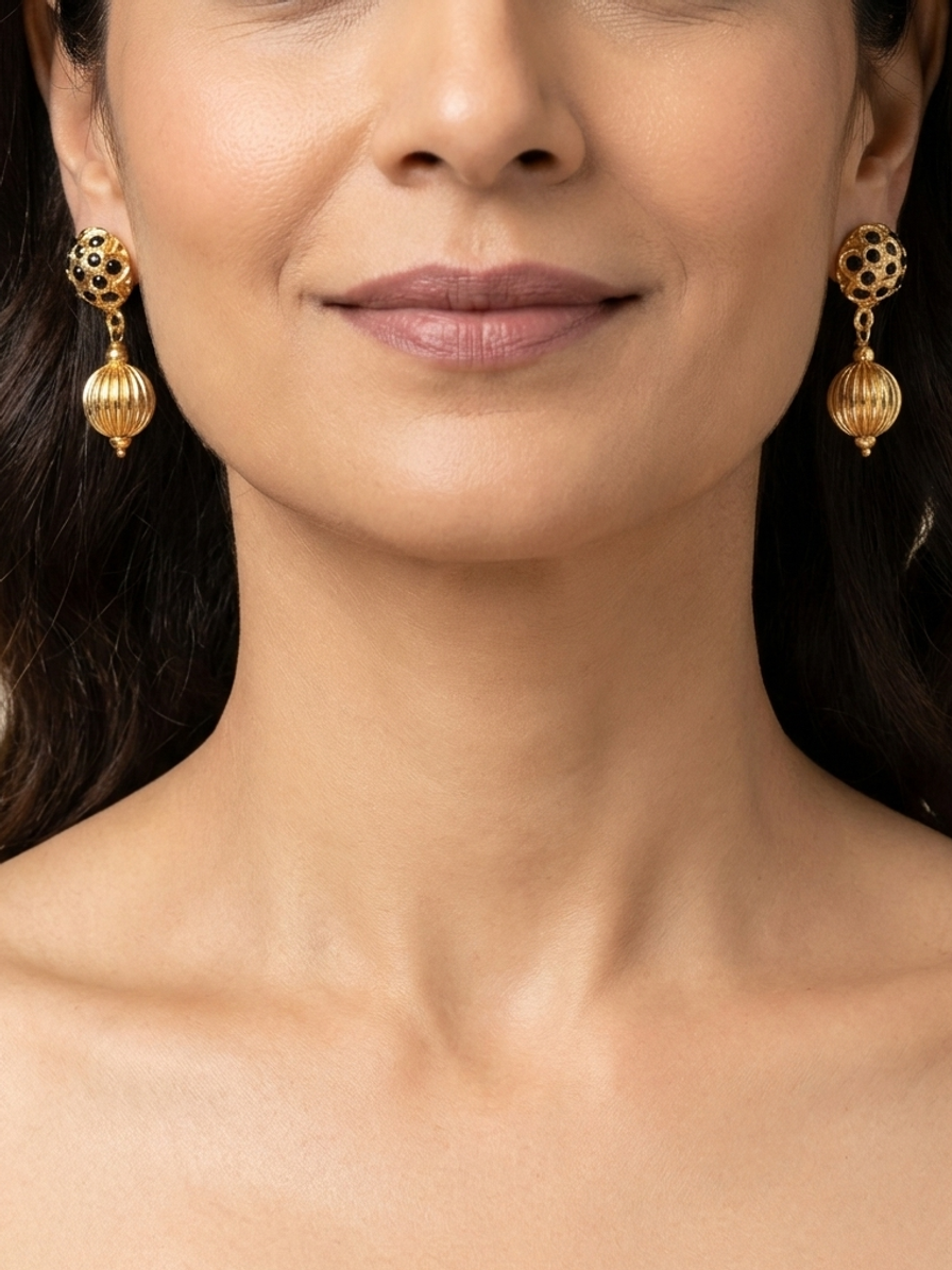 Onyx Majlis Drops — handmade black stones jewelry by Sima & Sid, shown on a model
