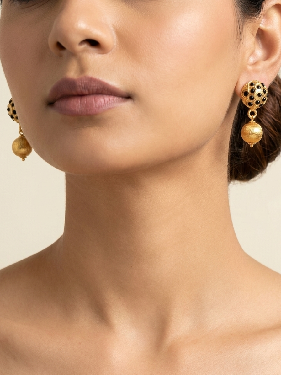 Noir Temple Drops — handmade black glass beads jewelry by Sima & Sid, shown on a model