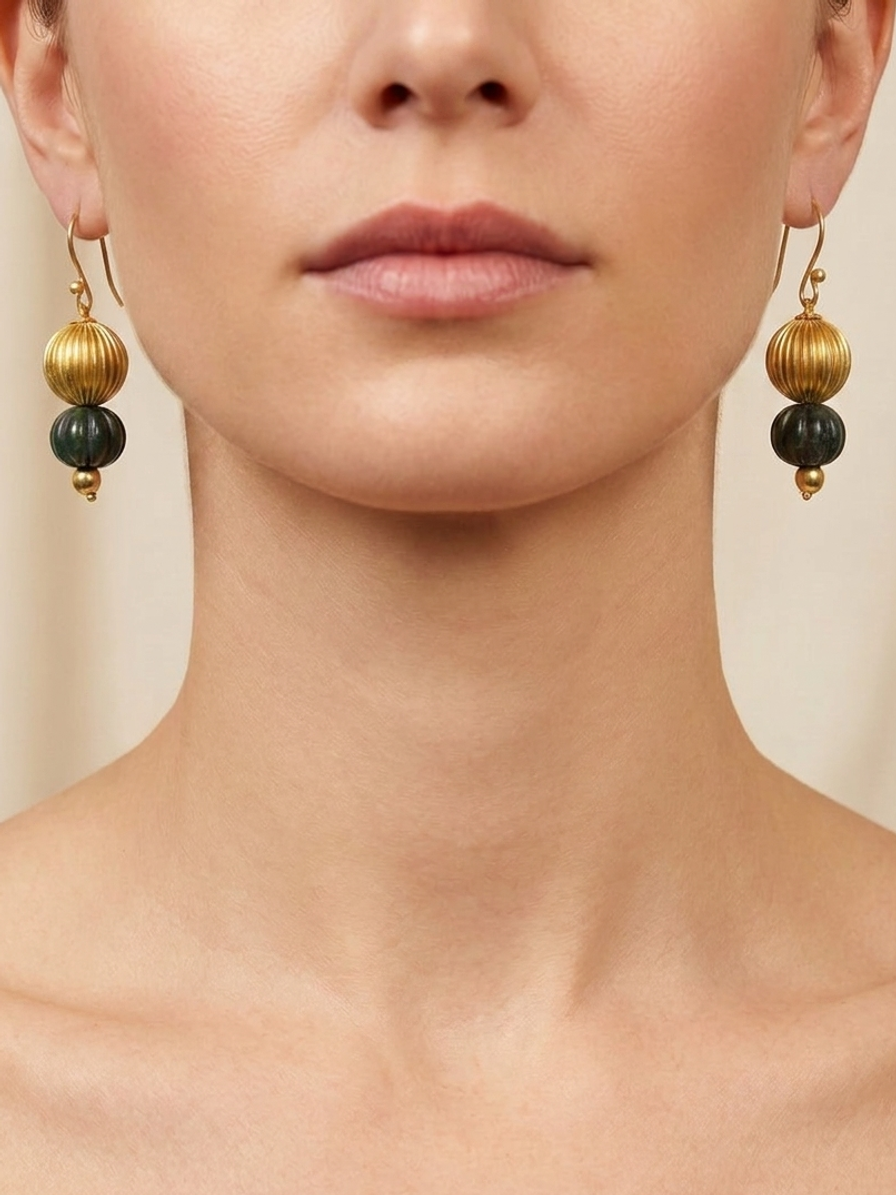 Emerald Temple Drops — handmade gold-tone fluted beads jewelry by Sima & Sid, shown on a model
