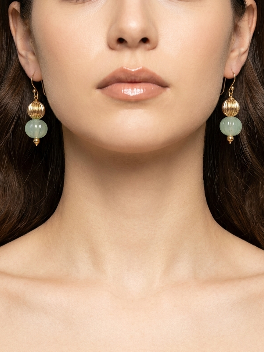 Celadon Pavilion Drops — handmade celadon green glass jewelry by Sima & Sid, shown on a model