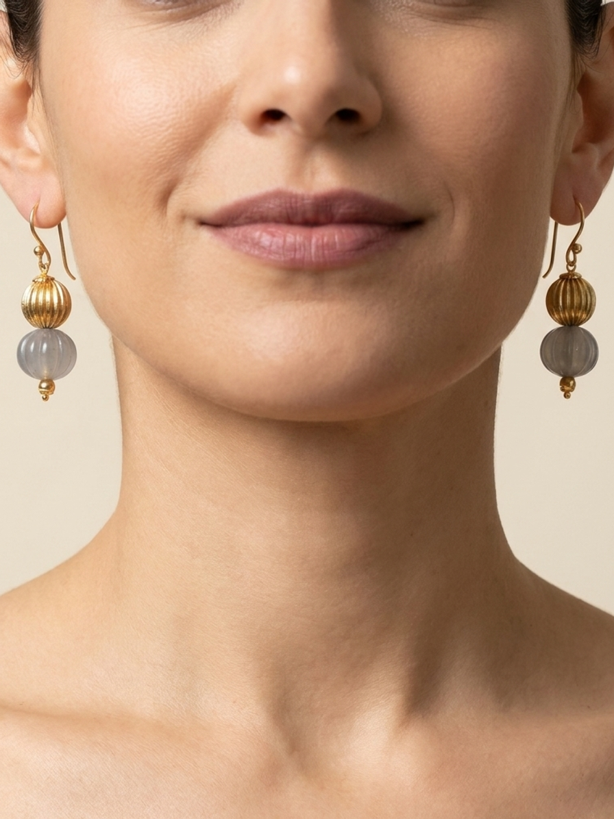 Smoke Pavilion Drops — handmade translucent grey glass jewelry by Sima & Sid, shown on a model