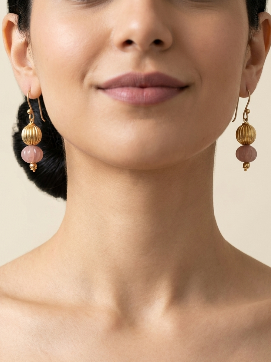 Rose Lantern Drops — handmade dusty rose glass beads jewelry by Sima & Sid, shown on a model
